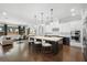 Modern, open-concept kitchen featuring stainless steel appliances, a large island, and stylish seating at 1365 Tappie Toorie Cir, Lake Mary, FL 32746
