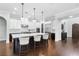 Gourmet kitchen with large island, stainless appliances and eat-in kitchen dining area at 1365 Tappie Toorie Cir, Lake Mary, FL 32746
