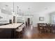 Gourmet kitchen with large island, stainless appliances, and hardwood flooring at 1365 Tappie Toorie Cir, Lake Mary, FL 32746