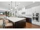 Bright kitchen with seating at island, with stainless appliances, and an open-concept layout at 1365 Tappie Toorie Cir, Lake Mary, FL 32746
