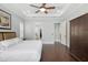 Spacious main bedroom features tray ceilings, hardwood floors, and ensuite bathroom access at 1365 Tappie Toorie Cir, Lake Mary, FL 32746