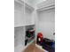 Spacious walk-in closet with ample shelving and storage, perfect for organization and convenience at 1365 Tappie Toorie Cir, Lake Mary, FL 32746