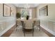 Elegant dining room with chandelier and stylish decor, perfect for formal gatherings at 1425 Riviera Dr, Kissimmee, FL 34744
