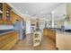 Spacious kitchen with wood cabinets, stainless steel appliances, and ample counter space at 1425 Riviera Dr, Kissimmee, FL 34744