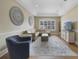 Cozy living room with comfortable seating, neutral colors, and stylish decor at 1425 Riviera Dr, Kissimmee, FL 34744