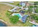 Overhead view of neighborhood amenities including pool, playground, and lush greenery at 1429 Carey Glen Cir, Orlando, FL 32824