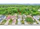 Aerial view shows this well-maintained single Gathering home with a long driveway and manicured front yard at 1429 Carey Glen Cir, Orlando, FL 32824