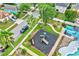 Overhead view of neighborhood playground with safety ground cover and lush palm tree landscaping at 1429 Carey Glen Cir, Orlando, FL 32824