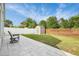 Spacious backyard with privacy fence, patio area, shed, and green grass at 1429 Carey Glen Cir, Orlando, FL 32824