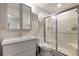 Modern bathroom features a vanity, toilet, and glass-enclosed shower with bright neutral tones at 1429 Carey Glen Cir, Orlando, FL 32824