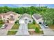 Charming single-story home with well-manicured lawn and a paved driveway and mature landscaping at 1429 Carey Glen Cir, Orlando, FL 32824