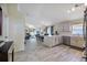 Expansive kitchen flows into the dining and living areas, perfect for entertaining and Gathering gatherings at 1429 Carey Glen Cir, Orlando, FL 32824