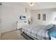 Bedroom featuring ample space, mounted television, and natural light from a nearby window at 1429 Carey Glen Cir, Orlando, FL 32824