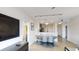 Open-concept living space with dining area, modern lighting, and seamless kitchen access at 14501 Grove Resort Ave # 2440, Winter Garden, FL 34787