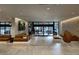 Spacious lobby featuring modern seating, stylish lighting, and a welcoming, contemporary design at 14501 Grove Resort Ave # 2440, Winter Garden, FL 34787