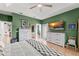 Spacious bedroom features terracotta floors, neutral decor, and access to a closet at 17523 Doris St, Montverde, FL 34756