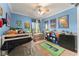 Bright bedroom with a bunk bed, desk, and a playful Minecraft theme at 17523 Doris St, Montverde, FL 34756