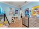 bedroom featuring blue walls, bunk beds, and ample storage space at 17523 Doris St, Montverde, FL 34756