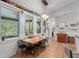Charming eat-in kitchen featuring tile floors, pendant lights and a vintage decor at 17523 Doris St, Montverde, FL 34756