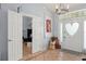Bright foyer featuring tiled floors, a stylish front door with glass and an adjacent office space at 17523 Doris St, Montverde, FL 34756