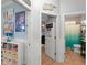 Hallway view showcasing doorways to a bedroom and bathroom at 17523 Doris St, Montverde, FL 34756