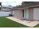 Exterior view of the back of the house featuring sliding glass door and fenced-in yard at 1827 Blaine Ter, Winter Park, FL 32792