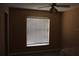 Bedroom featuring a window with blinds, a ceiling fan, and carpeted floors at 1827 Blaine Ter, Winter Park, FL 32792