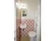 Cozy bathroom featuring retro tiles and fixtures at 1975 Waldo St, Orlando, FL 32806