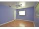 Bright bedroom with laminate flooring and a large window at 1975 Waldo St, Orlando, FL 32806