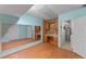 Finished basement area featuring a utility sink and a large mirror at 202 Ferryboat Ct, Orlando, FL 32828