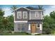 Charming two-story home featuring stone accents, gray siding, and a welcoming front porch at 2034 Education St, St Cloud, FL 34771