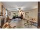 Inviting living room featuring ample space, a piano, and natural light at 2132 Palm Vista Dr, Apopka, FL 32712