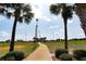 Inviting baseball field with palm tree-lined walkway, excellent for a community sports area at 2305 Rio Grande Forest Ln, Kissimmee, FL 34759