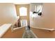 Bright foyer and staircase leading up to the bedrooms at 2305 Rio Grande Forest Ln, Kissimmee, FL 34759