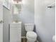 A bathroom featuring modern fixtures including a vanity and a toilet at 2704 Yule Tree Dr, Edgewater, FL 32141