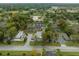 Aerial view displays the property's proximity to greenery, golf course and local neighborhood at 2826 Ne 7Th St, Ocala, FL 34470