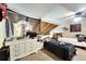 This is a secondary bedroom with a slanted ceiling and a comfortable double bed at 2826 Ne 7Th St, Ocala, FL 34470
