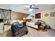 Bedroom featuring slanted ceilings, exposed brick, and two comfortable beds at 2826 Ne 7Th St, Ocala, FL 34470