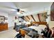 This bedroom features slanted ceilings, two beds, and closet space for ample storage at 2826 Ne 7Th St, Ocala, FL 34470
