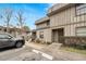 Two-story condo unit with front entrance landscaping and assigned parking at 2826 Ne 7Th St, Ocala, FL 34470