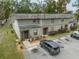 Exterior unit view showcases the tidy landscaping and accessible parking spaces at 2826 Ne 7Th St, Ocala, FL 34470