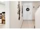 Entryway featuring tile flooring and decorative wall art at 2826 Ne 7Th St, Ocala, FL 34470