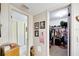 A small hall with access to a walk-in closet on the right and another room on the left at 2826 Ne 7Th St, Ocala, FL 34470