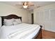 Bedroom with ceiling fan, wood floors, queen-size bed, and closet with sliding doors at 2928 Lake Pineloch Blvd # Ge, Orlando, FL 32806