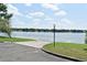 Scenic view of the lake with a boat ramp for easy water access on a sunny day at 2928 Lake Pineloch Blvd # Ge, Orlando, FL 32806