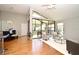 A spacious living room flows into the dining area, offering great natural light and outdoor access at 2928 Lake Pineloch Blvd # Ge, Orlando, FL 32806