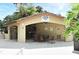 Community pool pavilion with tables, chairs, and covered area for relaxation and socializing at 2928 Lake Pineloch Blvd # Ge, Orlando, FL 32806