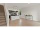 Open floor plan with stairs, a modern kitchen, and bright natural light at 3301 Tranquil Trl, Kissimmee, FL 34747
