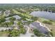 Aerial view of community amenities featuring tennis courts, pool and clubhouse at 388 Hampton Hills Ct, Debary, FL 32713