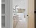 Modern bathroom with double vanity, soaking tub, and glass-enclosed shower at 388 Hampton Hills Ct, Debary, FL 32713